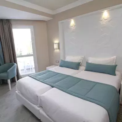 chambre avec 2 lits collés