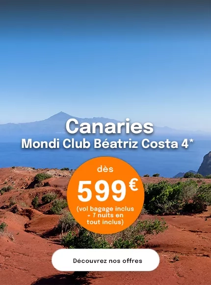 un sol rouge avec en arrière plan la mer