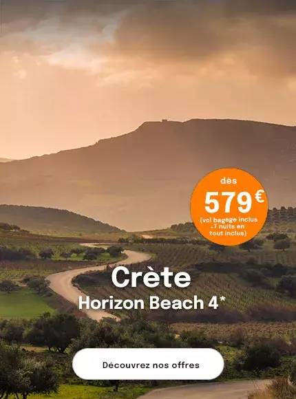 Un coucher de soleil sur une montagne en Crète avec des champs d'oliviers en premier plan pour proposer une offre dès 579€