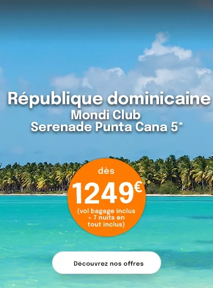 une plage aux eaux turquoise avec cocotiers en république dominicaine avec une offre à 1249€