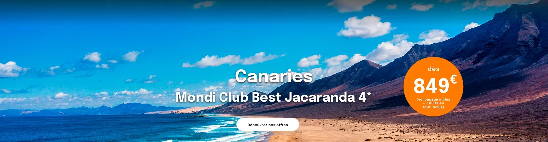 une plage des Canaries avec la mer et des montagnes