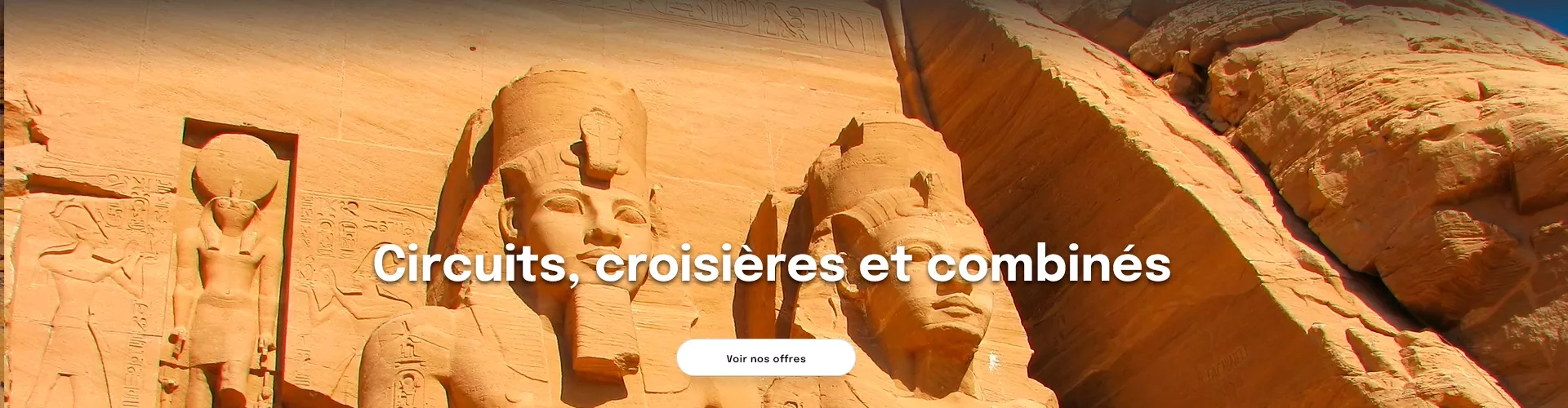 une partie de la façade du temple d'Abou Simbel représentant 2 statues géantes de pharaons