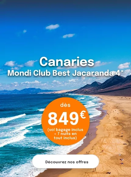 une plage des Canaries avec la mer et des montagnes