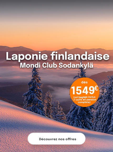 Coucher de soleil sur montagnes enneigées